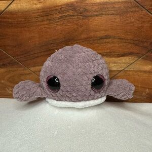 Handmade crocheted dark mauve colored plushy with sparkly eyes
